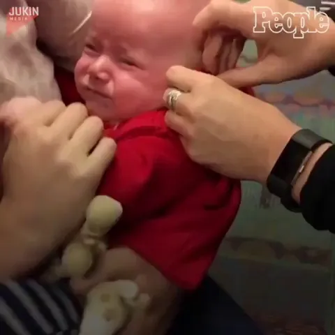 Baby gets ear (cochlear) implant and hears for the first time