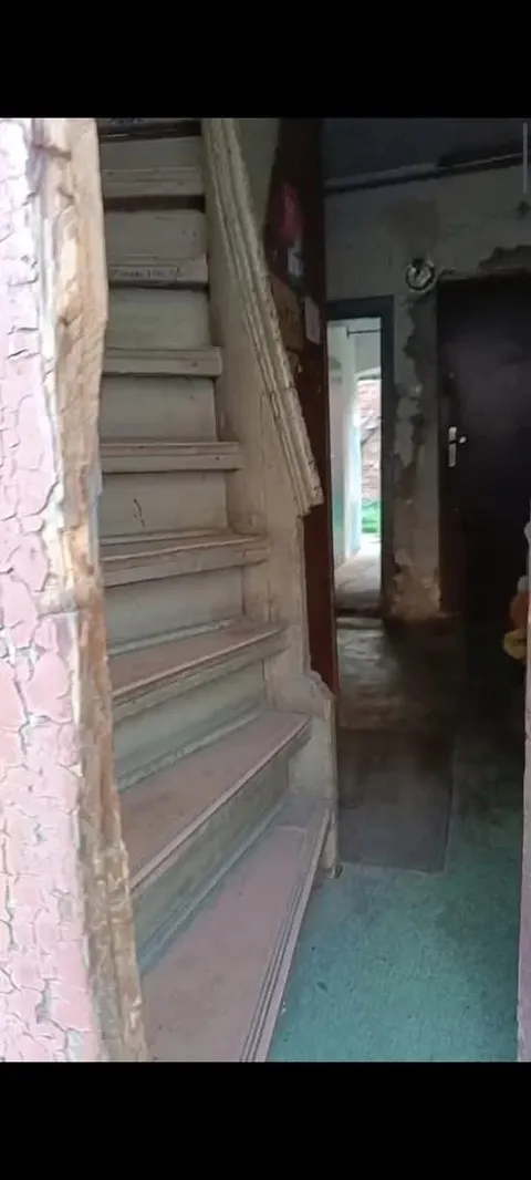 saw a post about the narrowest car in the world. here are stairs from a tenement in Poland. they are practically completely vertical
