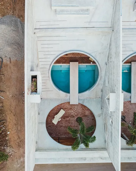 Casa Hezbo by French architect Ludwig Godefroy embraces a bold Brutalist aesthetic while blending indoor-outdoor living in Puerto Escondido.