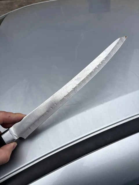 Took my expensive knife to a local sharpener. This is how it came back.