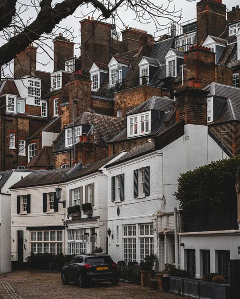 The many dormers and chimneys of townhouses in Knightsbridge, London, UK.