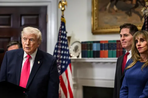 Donald Trump with The Dells (Michael and Susan) at White House launching his new scam, Trump Account