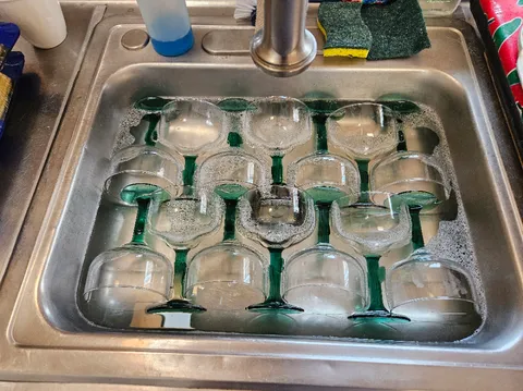 How all the margarita glasses can fit in the sink.