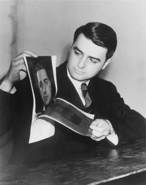 Inventor Edwin Herbert Land, demonstrates his instant camera that makes it possible for a picture to be taken and developed in 60 seconds or less, 1947