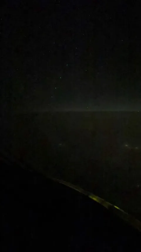 Starlink satellite train as seen from the cockpit