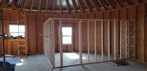 Spent several years building a complete 1300 sq ft roundhouse from top to bottom with my wife, including all framing, electrical, plumbing, HVAC, etc. By far the worst idea we've ever had, and so happy to be in it finally.