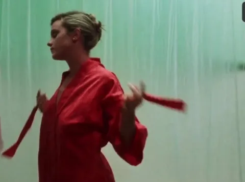 Kimberly Johnston gets naked in the (Psycho homage) shower scene in Shallow Grave. 1987