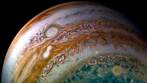 NASA's JUNO saw two merging storms on Jupiter