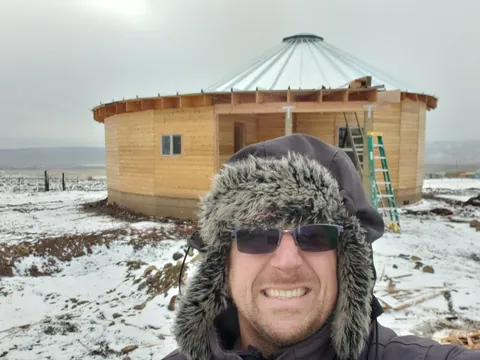 Spent several years building a complete 1300 sq ft roundhouse from top to bottom with my wife, including all framing, electrical, plumbing, HVAC, etc. By far the worst idea we've ever had, and so happy to be in it finally.