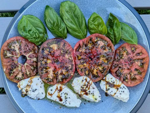 Home garden Caprese salad (True Black Brandywine heirloom)[OC]