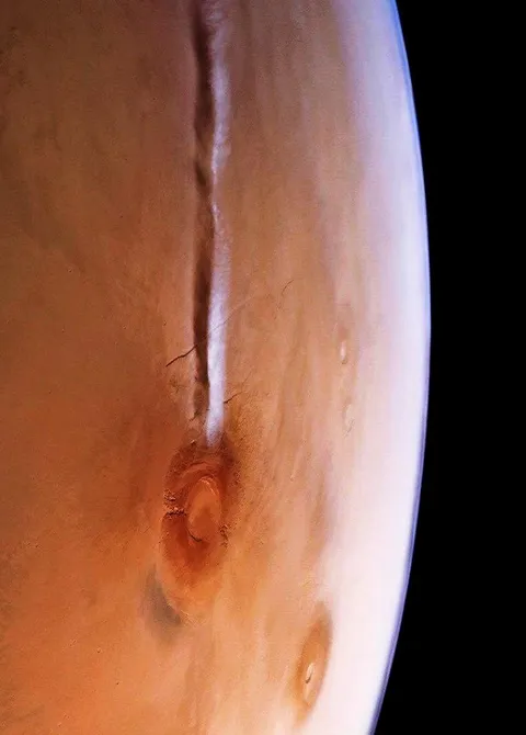 A cloud over Mount Arsia on Mars, stretching over 1,500 kilometers