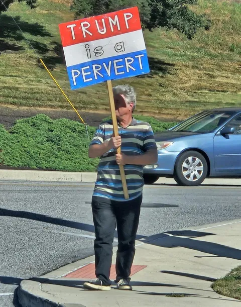 Man standing outside York Hospital holding this sign. (PC to its rightful owner)