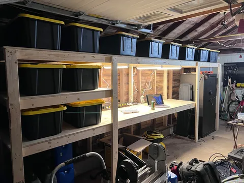 Completed a weekend project! Shelves and a workbench built into my garage.