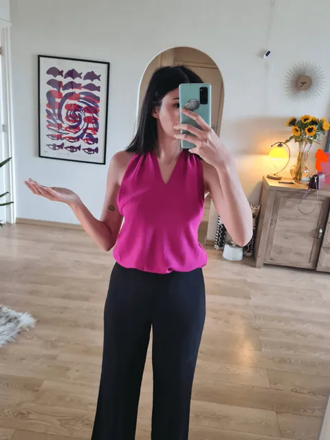 Styling this boring top with a hair clip. Thoughts?