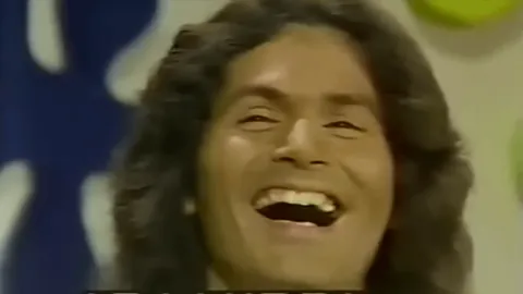 Serial killer and rapist Rodney Alcala laughing after winning a date with Cheryl Bradshaw on The Dating Game in 1978.