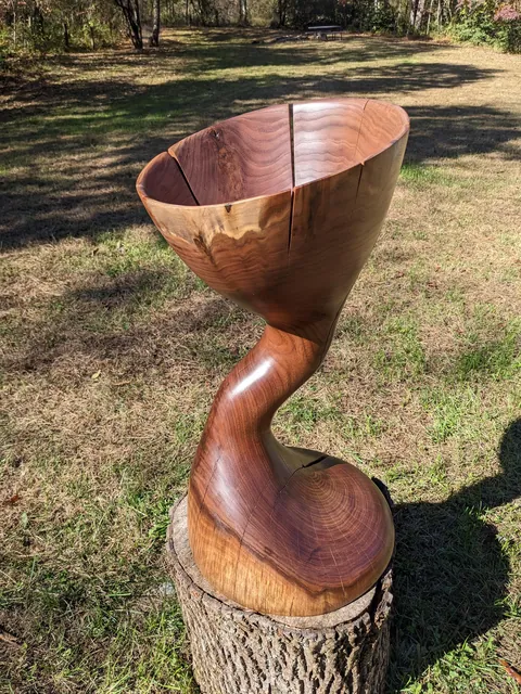 Just spent my last 3 years worth of Fall and Spring downtime carving a wooden wormhole from a single log. The concept just excites the heck out of me.