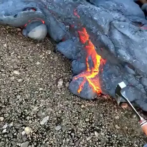 Collecting fresh lava to research.