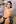 Accidentally topless, intentionally smiling