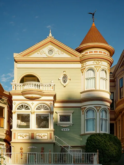 House with a turret on Steiner Street across Alamo Square Park, Alamo Square, San Francisco.