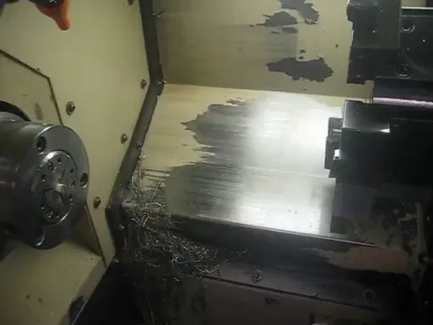 CNC-Lathe machine programmed to sharpen worker's pencil (when boss is away).