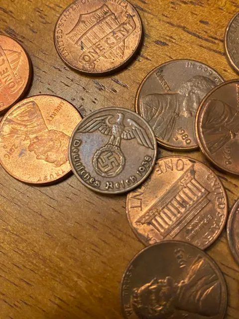 Cleaning off my dresser and found a Nazi coin mixed with my pocket change.