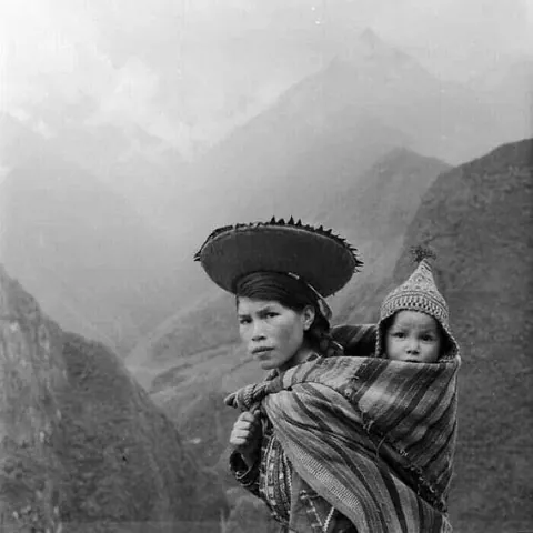 A Peruvian woman and her son in the Andes, 1930s