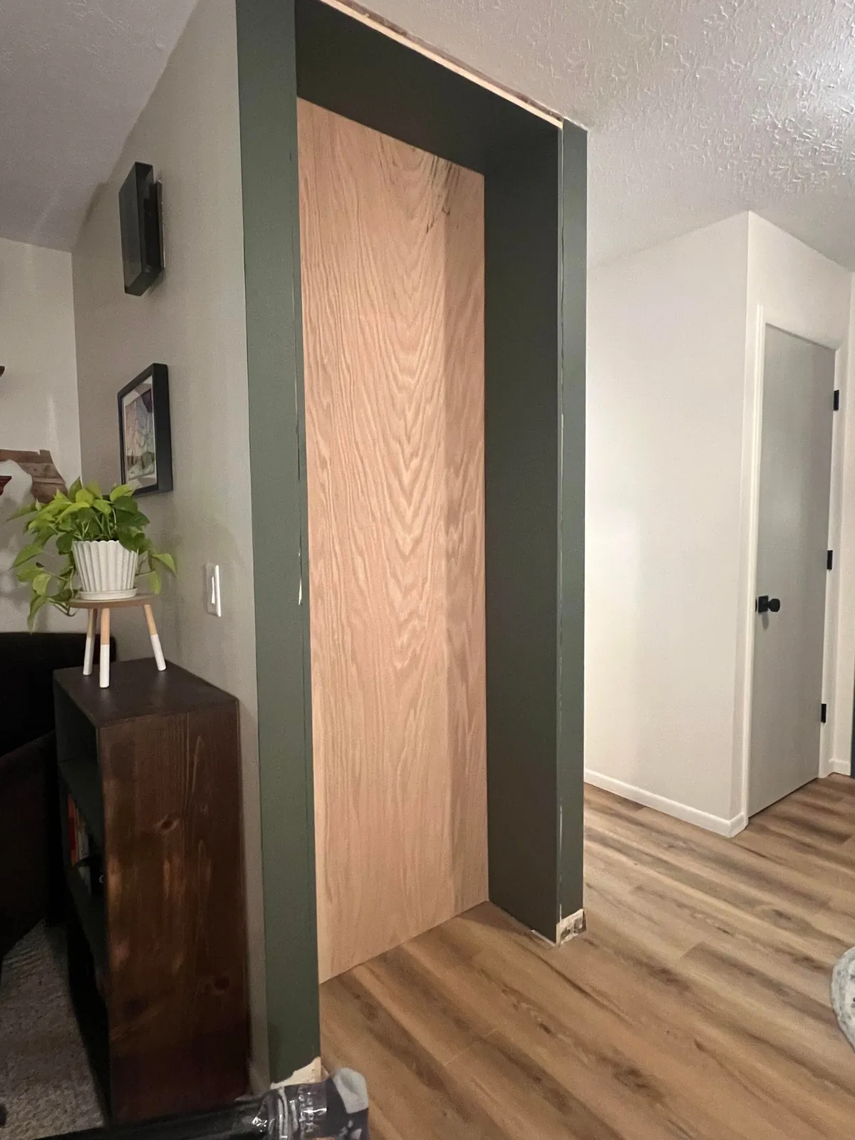 Reclaimed unused coat closet for pantry expansion
