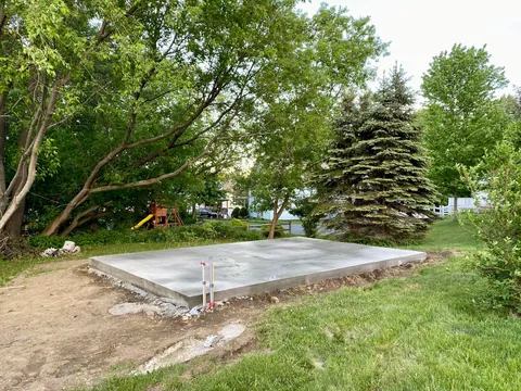 I built a 500 sq ft backyard shed studio for my photography business. I personally handled every phase from design to completion except for concrete, electrical, and HVAC. It's insulated and comfortable year round here in New Hampshire.  Ask me anything!