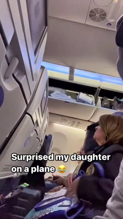 Dad surprised daughter in the airplane