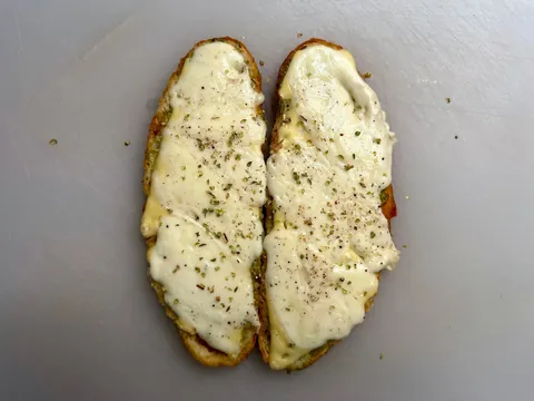 Mozzarella, tomato, and pesto melt on [homemade] bread