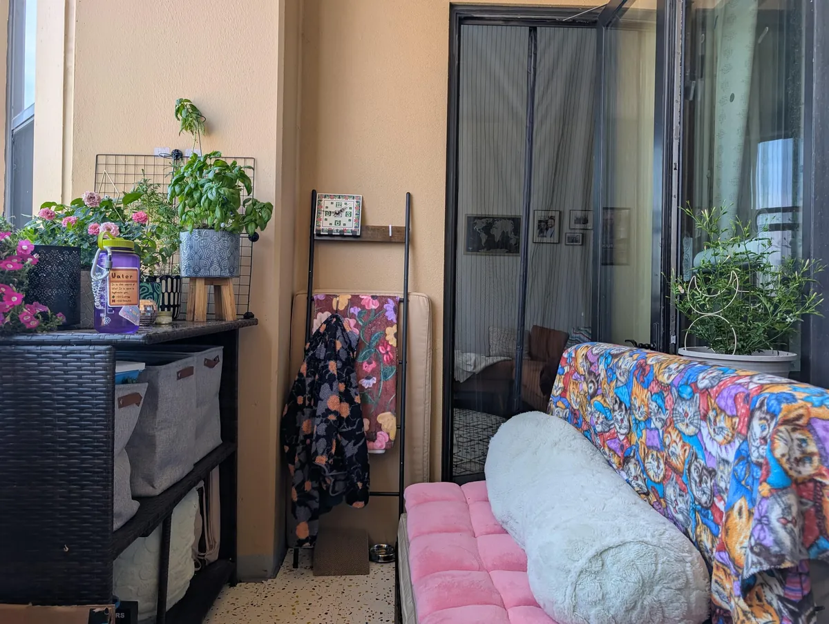 My balcony where I spend all of my time ft. my cat Tater