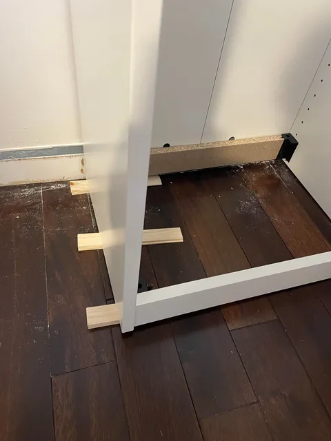 Is there any reason not to stack two shims when raising one end of a wardrobe?