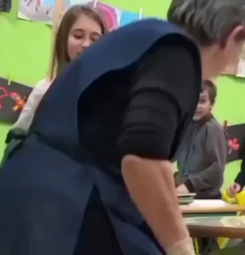 4th grade children surprised their favourite cleaning lady.