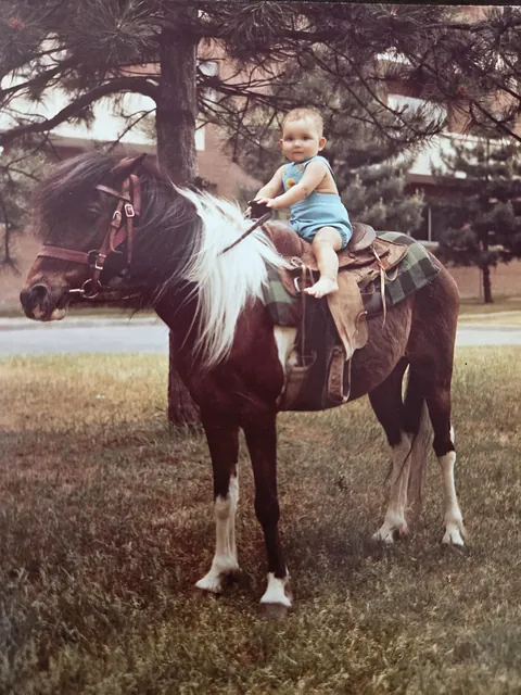 Anyone else have a random pony picture taken? Me less than a year old in front of the apartment I lived in. A random man traveling with a pony in the city used to take these pictures for a few bucks.