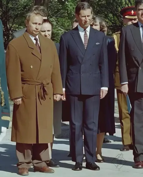 May 16, 1994. Vladimir Putin shows Prince Charles around St. Petersburg.