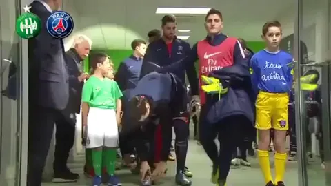 Old man trying to switch kids, so his kid can be paired with the popular athlete.