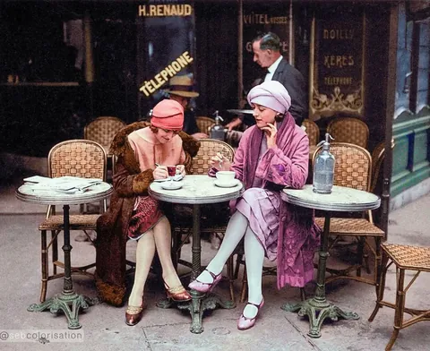 Women having a drink on the terrace of a Café in Paris, France in 1925