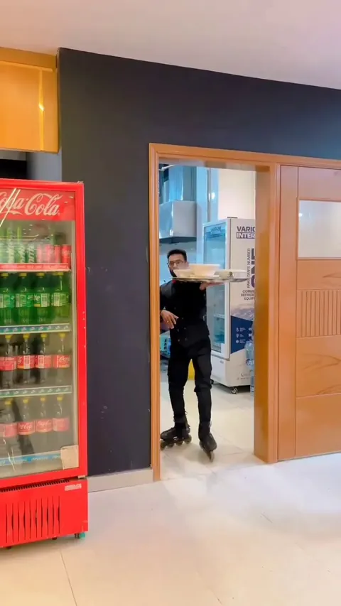 Someone thought it was a good idea to have waiters on skates