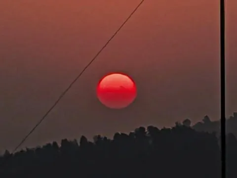 Sun spots (4274?) visible to the naked eye due to dust storm