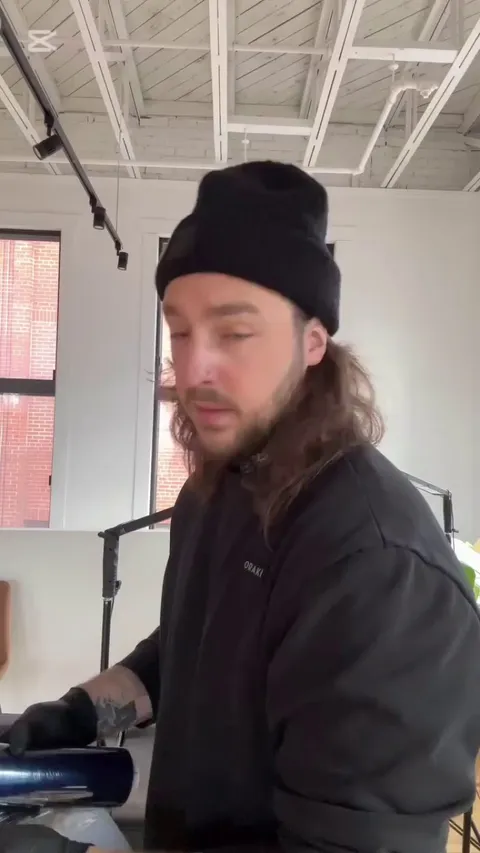 Custom built glasses with polarized filters to help in tattooing dark skin