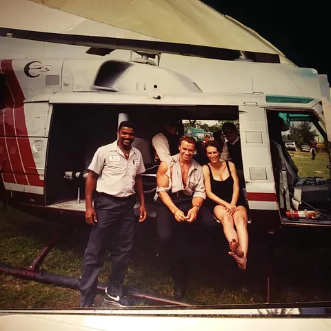 My stepdad did the all the flight rigging for Jamie Lee Curtis in True Lies. He's 70 this year and going strong as an ox. This is him with Arnold Schwarzenegger and Jamie Lee Curtis.