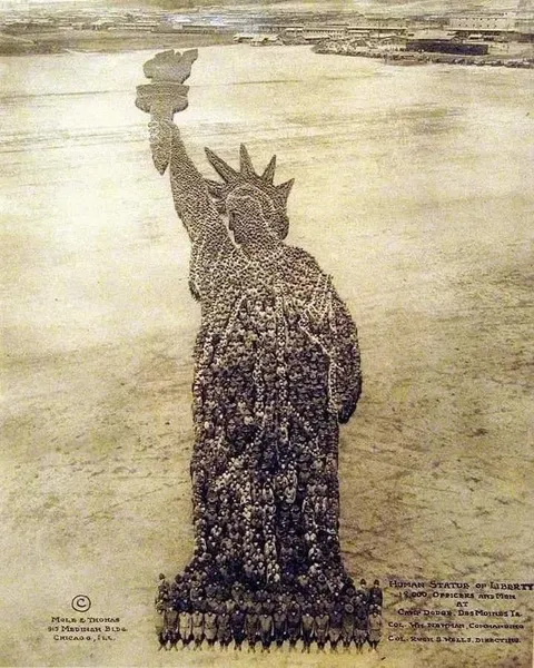 The shape of the Statue of Liberty is formed by 18,000 soldiers standing in formation. Camp Dodge, Des Moines, Iowa, USA. Ca. 1918.