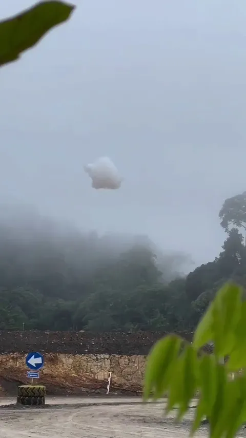 A cloud falls from sky near construction site in Indonesia 