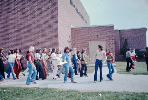 High schooler poses with her plataform shoes, Circa mid 1970s.