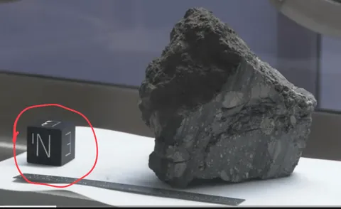 Meaning of the dice in Lunar Rock Vault exhibit?