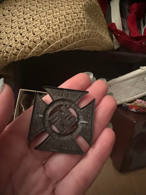things my girlfriend great grandfather took off dead nazis bodies during WW2