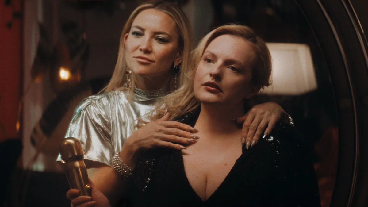 First Image of Kate Hudson &amp; Elisabeth Moss in body-horror 'SHELL' - Struggling actress Samantha tries Shell’s eternal youth treatment, dramatically improving her life and befriending CEO, Zoe. When former clients, including social media star Chloe Benson, go missing, Samantha fears for her safety