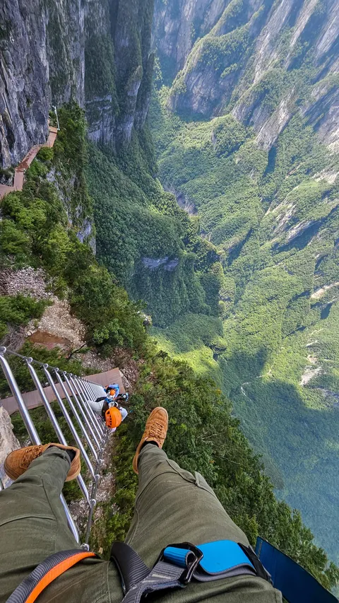 1480 meters big wall Via Ferrata and 168 meters sky ladder climbing challenge in Qixing moutain, Zhangjiajie, China during a solo travel
