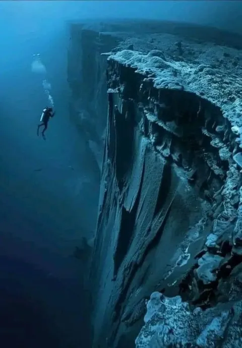 The 'Deep Seabed' is defined as the ocean region that drops to a depth of more than 6,000 feet; extending then to the abyssal plains that can drop to over 18,000 feet (3 miles+). The Titanic itself was found at a depth of 12,500 feet.