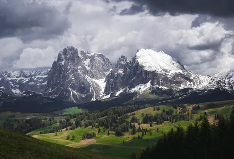 I feel like the Italian Alps are underappreciated on reddit, so here's a view of Langkofel and Seiser Alm